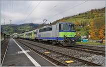 The BLS Re 4/4 II 501 with a RE by his stop in Boltigen. 22.10.2019