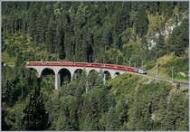 The RhB Ge 4/4 III 649  20 Minuten  with his Albula Fast-Serice from Chur to St Moritz by Filisur. 

12.09.2016