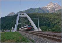 Two SBB RBDe 560 DOMINO on the way to Lausanne on new  Massogex Bridge  between St Maurice and Bex.

25.06.2019