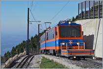 The Monte Generoso Bhe 4/8 11 is arriving at the summit Station Generoso Vetta.

27.09.2018