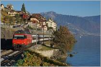 A SBB Re 460 with an IR 90 on the way to Geneve Airport by St Saphorin. 

16.10.2017