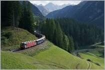 A RhB Ge 4/4 III with Albula Fast Service on the way to Chur near Bergün. 

14.09.2016
