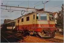 The SBB Re 4/4 II 11253 wiht the fast train service 538 by his stop in Grenchen Süd.

04.08.1984