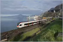 A SBB RABe 523 on the way to Lausanne by the Castle of Chillon.

04.01.2020