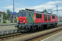 PoPoBo: Polish EP09-023 wearing the Portuguese flag during the UEFA-2012 advertisement campaign, is about to get coupled to EuroCity JAN SOBIESKI at the Czech border station of Bohumin on 30 May 2012.