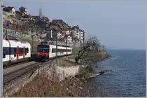 A SBB RBDe 560  Domino  on the way to Lausanne by St-Saphorin.

06.02.2018