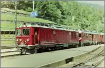The RhB Gem 4/4 802 and a ABe 4/4 in Posciavo. 

Sept. 1993 