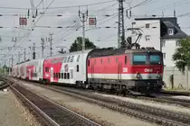 ÖBB 1144 274 pushes a regional express out of Wiener Neustadt on 31 May 2015.