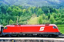 Side view on 1016 046 -with the old S-style ÖBB emblem- at Schwarzach st.-Veit on 29 May 2004.