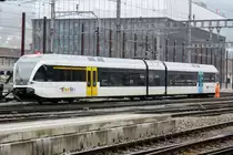 Yellow door: ThurBo 746-3 runs light at Olten on 24 March 2017.