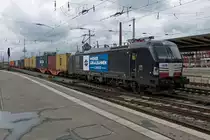 WLC X4E-606 hauls a container train through Bremen Hbf on 27 April 2016.