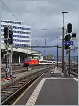 A SBB IC to St Gallen is leaving the Lausanne Station. 

26.02.2020