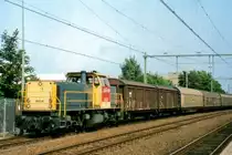 ON 16 January 2004 NS Cargo 6424 hauls a block train through Tilburg toward Bergen-op-Zoom.