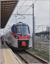 The FS Trenitalia TPER ETR 103 015 in Reggio Emilia on the way to Guastalla. 

14.03.20235