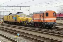 On 20 February 2023 RFO 9702 -still in the colours of her former owner LOCON- shunts a diagnostical train at Amersfoort.