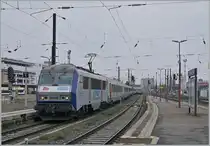 The SNCF GRAND EST BB 26152 reaches Strasbourg train station with its TER 200 from Basel. 

March 12, 2024