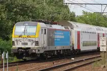 NMBS 1875 pushes an IC service from Oostende out of Antwerpen-Berchem on 18 August 2024.