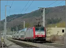 4020 is pushing its train to Wiltz between Lintgen and Mersch on February 18th, 2010.