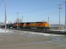 A pair of ex-Santa Fe BNSF diesel loks perform switching duty in the Burlington, Iowa yard, 3 Mar 2010.