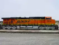 BNSF 5876 sits at the Burlington, Iowa depot shortly after delivery and before its silver fuel tanks get stained with the ugly residue of spilled diesel fuel. 27 Feb 2006.