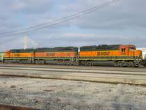 BNSF 2110, 325 and 3116 sit at the Burlington, Iowa yard on 6 Mar 2006.