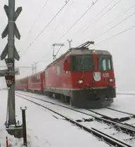 RhB Local train from Arosa to Chur is leaving in Peist. 
03.03.2009