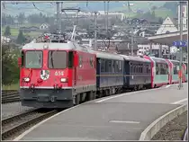 Ge 4/4 II 614  Schiers  with the Glacier Express is leaving the station of Disentis/Must�r on August 7th, 2007.