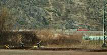 DB 152 with a Cargo Train to the  south direction on the right Rhein  Line. This picture is token from the DB station Oberwesel on the left Rhein line on the 19.03.2010.