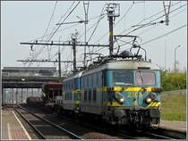 S�rie 23 double header is hauling a mixed freight train to the station of Antwerpen Noorderdokken on April 24th, 2010. 
