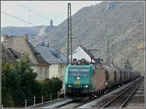 Rail 4 Chem 185 542-8 is hauling a goods train through the Rhine gorge near St. Goarshausen on March 19th, 2010. 