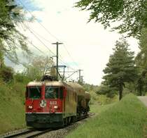 The RhB Ge 4/4 II 632 with two SBB Cargo Wagons by Reichenau. 
10.05.2010