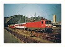 DR 112 003-3 with an IC in Leipzig Main Station. 
Mai 1993
(scanned analog picture)