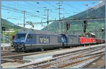 Two BLS Re 465 and two DB  185 with a cargo train in Brig. 
10.05.2007
