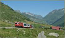 MGB HGe 4/4 with the Glacier Express 905 between Hospental and Realp. 
19.07.2010