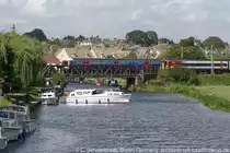 The River Great Ouse at Ely on a sunny holiday afternoon, with the unidentified First Capital Connect EMU 14,06 train to King’s Lynn and East Midlands DMU to Manchester.
30th of August 2010.