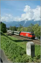  29 km to Lausanne, 25 km to St-Maurice  said the Stone on the Street. In the background Re 460 044-9 with IR to Gen�ve A�roport.
04.08.2010