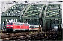 Two 218 engines are hauling a ICE 3 over the Hohenzollern Bridge in Cologne on November 20th, 2010.