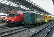 I am afraid the quality is not the best - but on this day is not very often to have the change to take a picture with a Re 4/4 I and a Re 460. 
11.11.2010