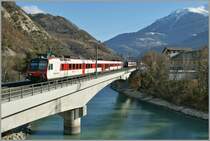  Walliser  Domino locals train on the Rhne Bridge by Leuk. 
21.01.2011