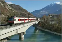  Walliser  Domino locals train on the R�hne Bridge by Leuk. 
21.01.2011