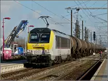 3007 is hauling a freight train through the station of P�tange on February 8th, 2011.