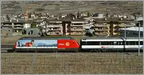 SBB RE 460 036-7 with the  snowtrain  for british winter-guests by Salgesch. 
05.03.2011