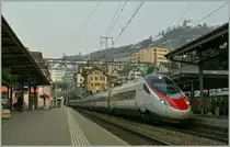 A SBB ETR 610 is arriving in Montreux Station. 
04.03.2011