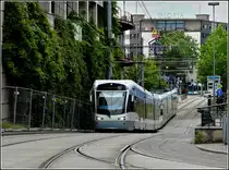 Saarbahn double unit to Sarreguemines (F) is arriving at the station of Saarbr�cken on June 22nd, 2009.