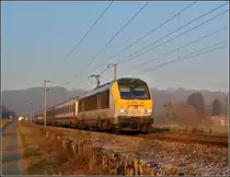 3017 is hauling the IR 117 Liers - Luxembourg City through Erpeldange/Ettelbr�ck on December 23rd, 2007.