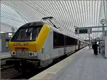 3003 is leaving the station Li�ge Guillemins in order to continue its way to Liers on February 6th, 2011.