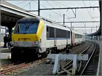 HLE 1359 with the IC A Oostende - Eupen taken at the station of Oostende on March 27th, 2011.