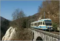 The local train 308 is just leaving the small Palagnedra Station to Camedo. 
24.03.2011