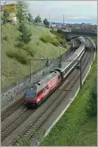 SBB Re 460 094-6 with a IR from Brig to Geneva Airport by Lausanne. 
28.09.2010