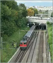 The SBB Re 4/4 II 11194 pushes the RE to Geneva by Lausanne. 
28.09.2010